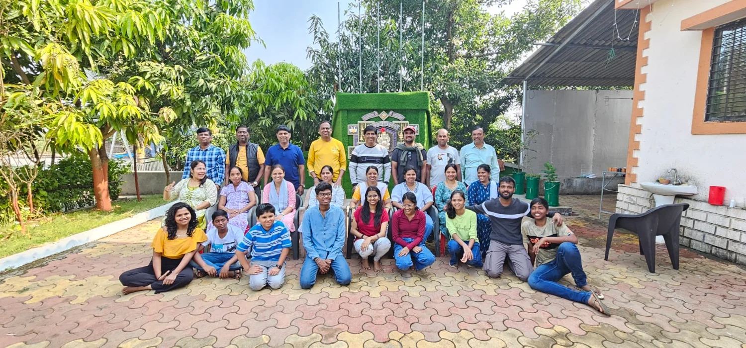 A group of guests gathered in the farm garden