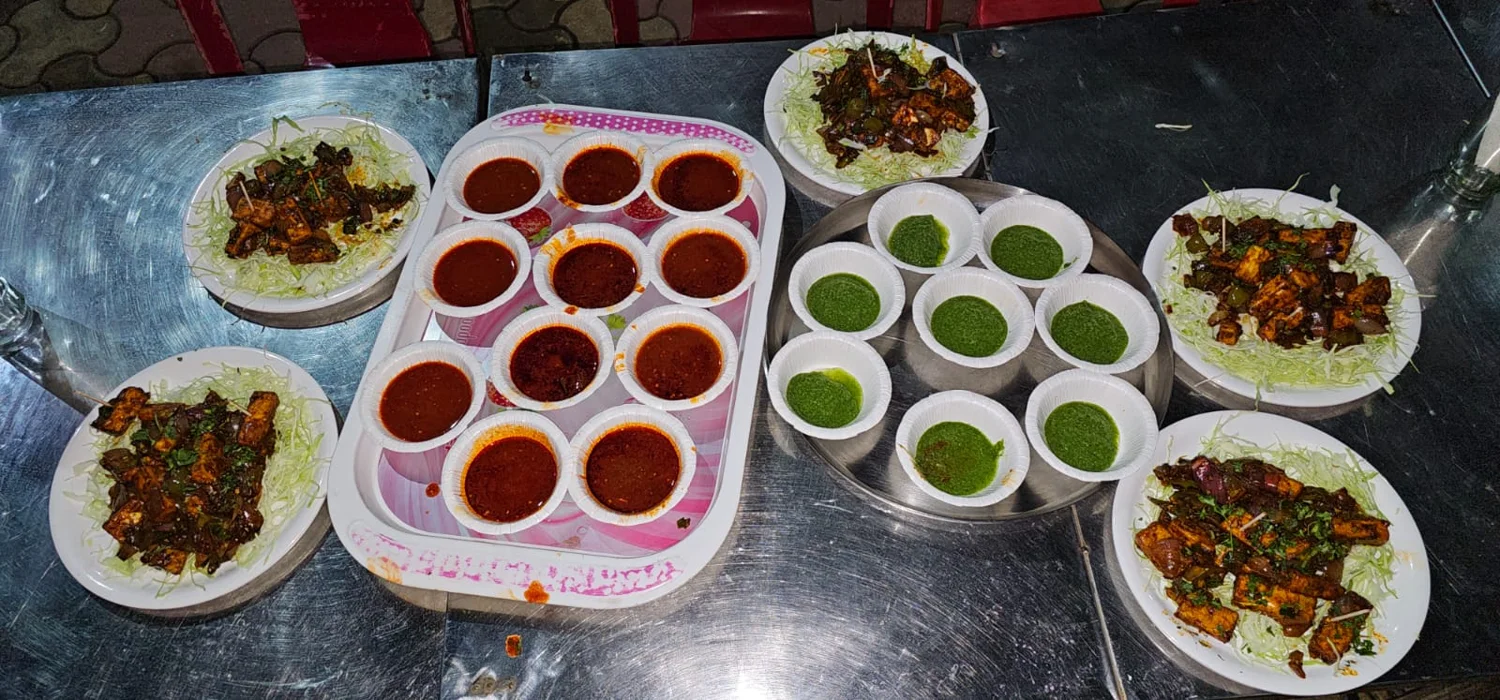 Traditional dishes and accompaniments laid out for a shared meal