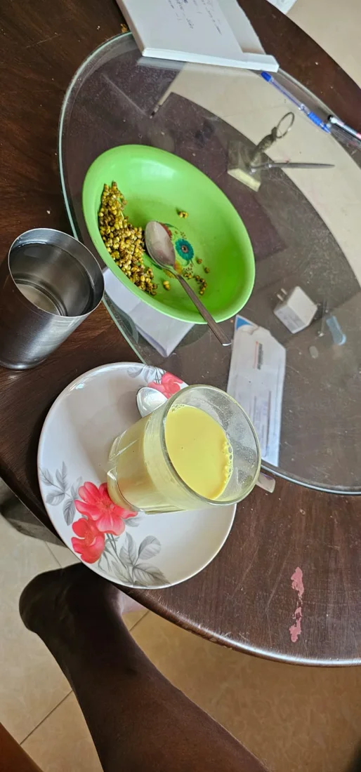 A serving of food and a drink at the farm